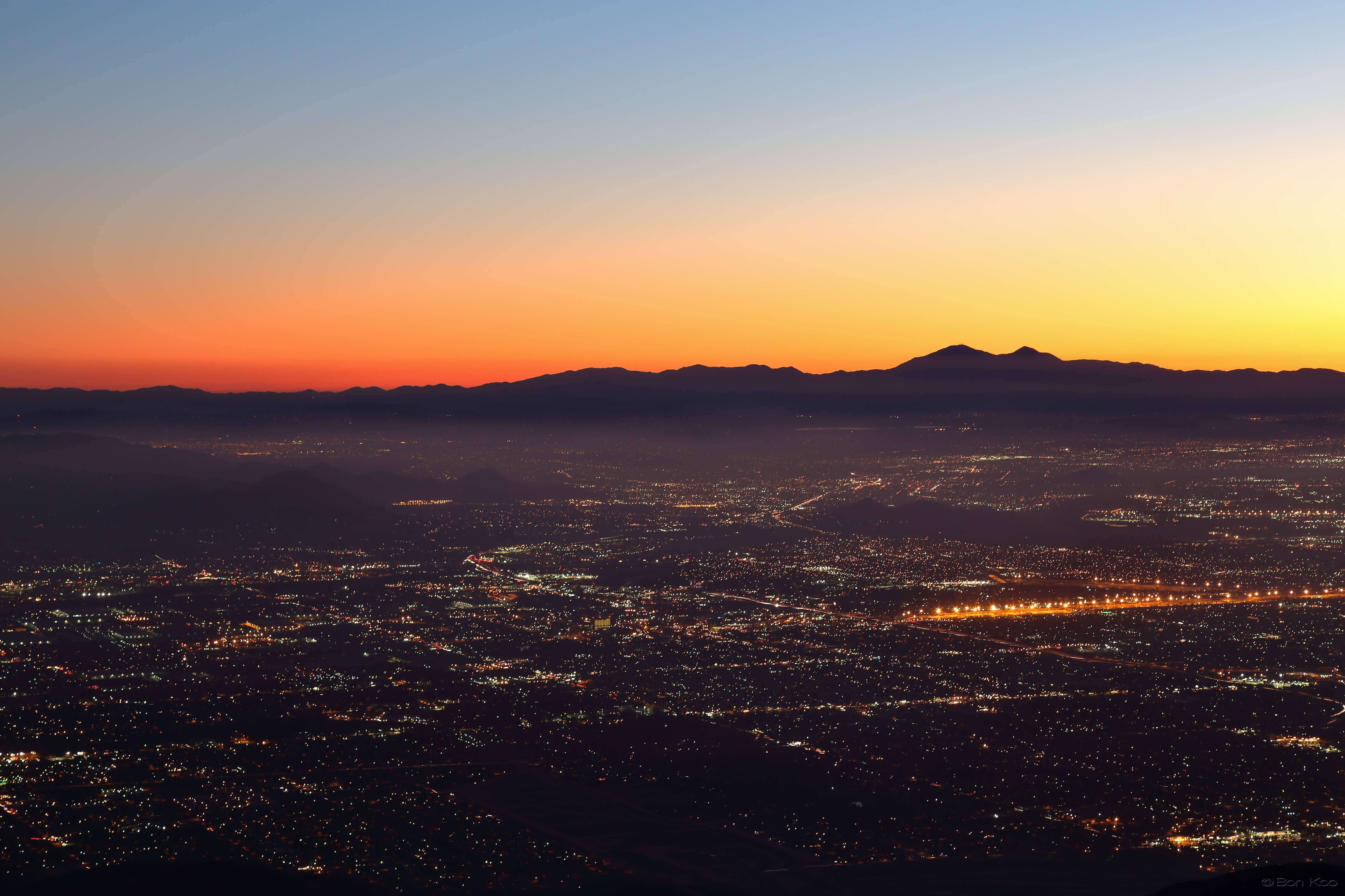 A high view of San Bernardino with a beautiful sunset against the mountains.